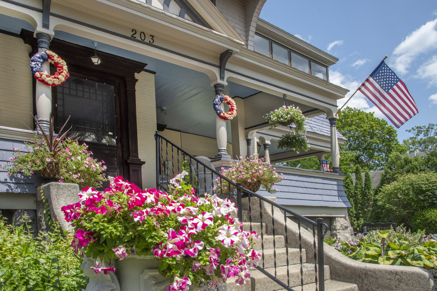 The entrance in summer bloom at the Union Avenue Thoroughbred Club