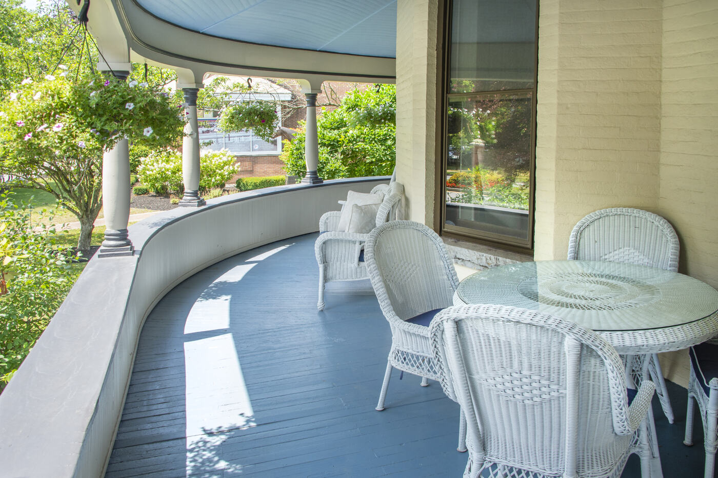The curved end of the wraparound porch at the Union Avenue Thoroughbred Club