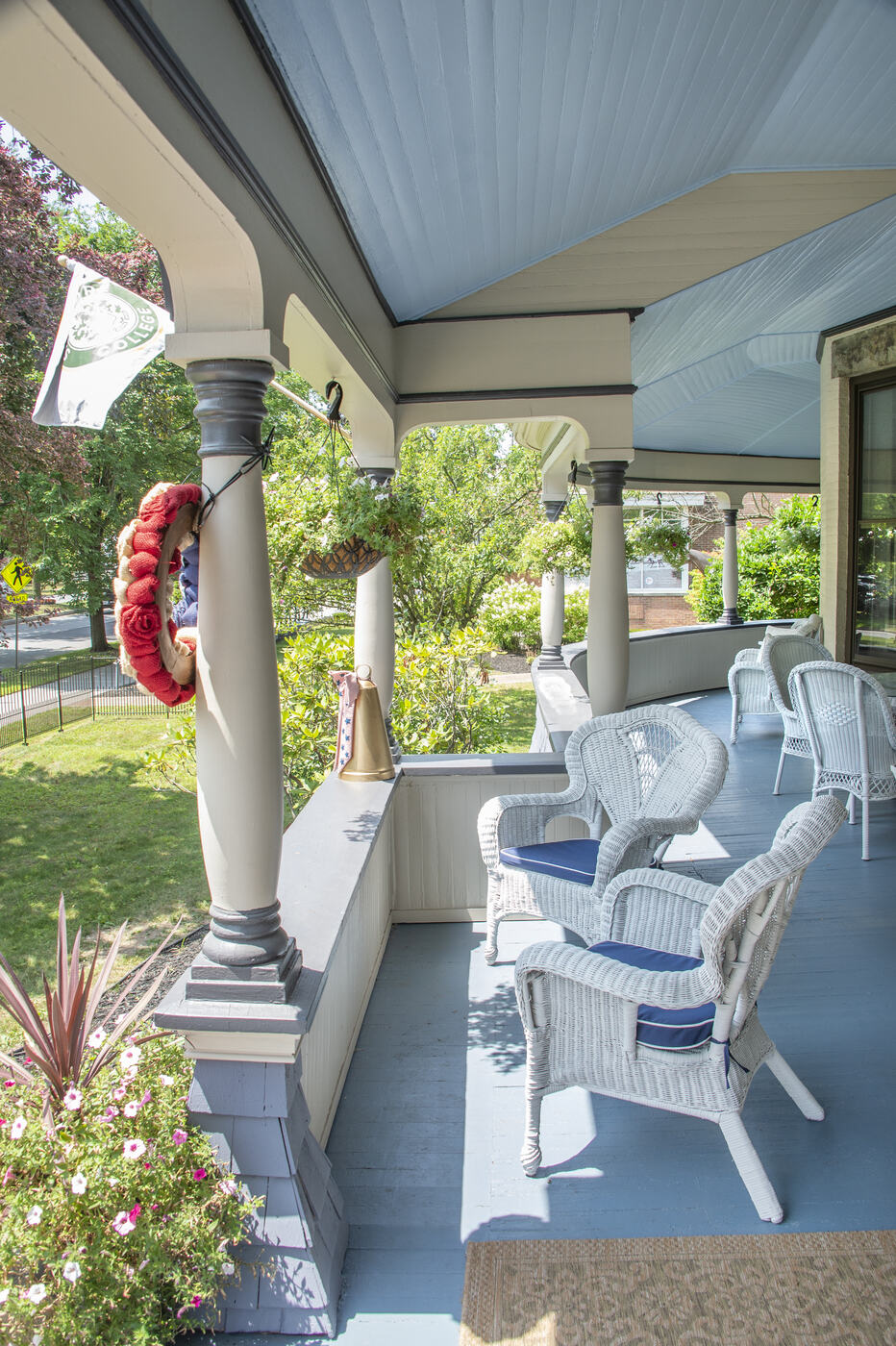 White wicker along the porch at the Union Avenue Thoroughbred Club