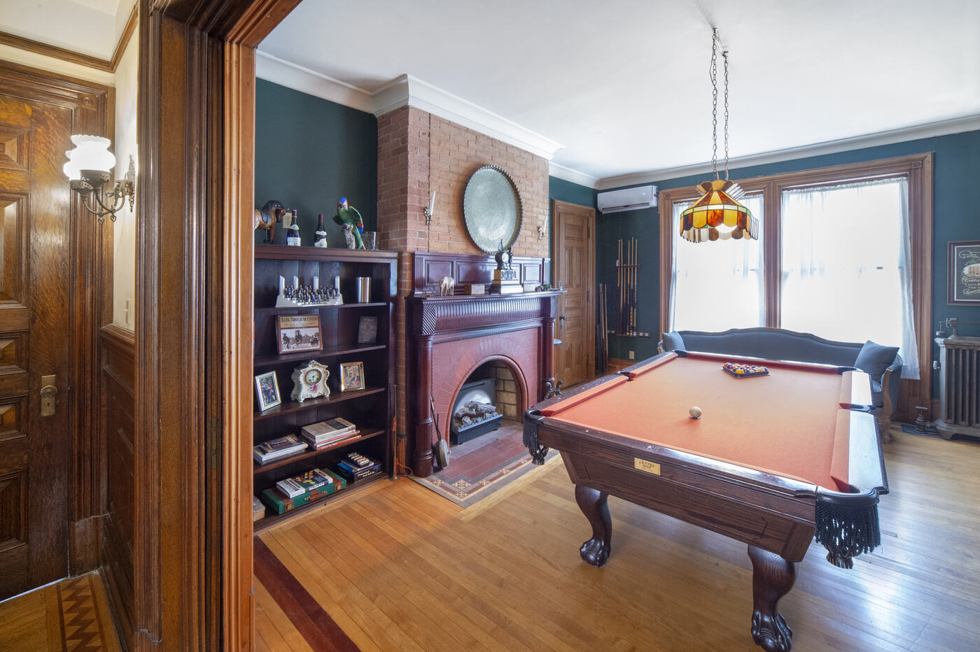 The billiards room fireplace at the Union Avenue Thoroughbred Club