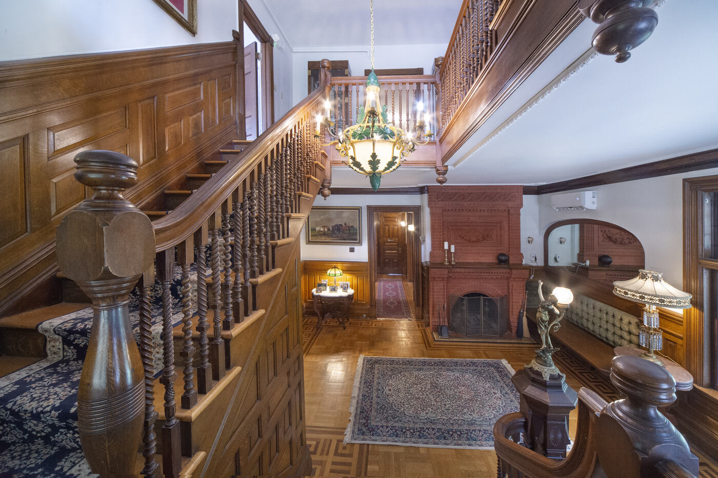 The front hall staircase at the Union Avenue Thoroughbred Club