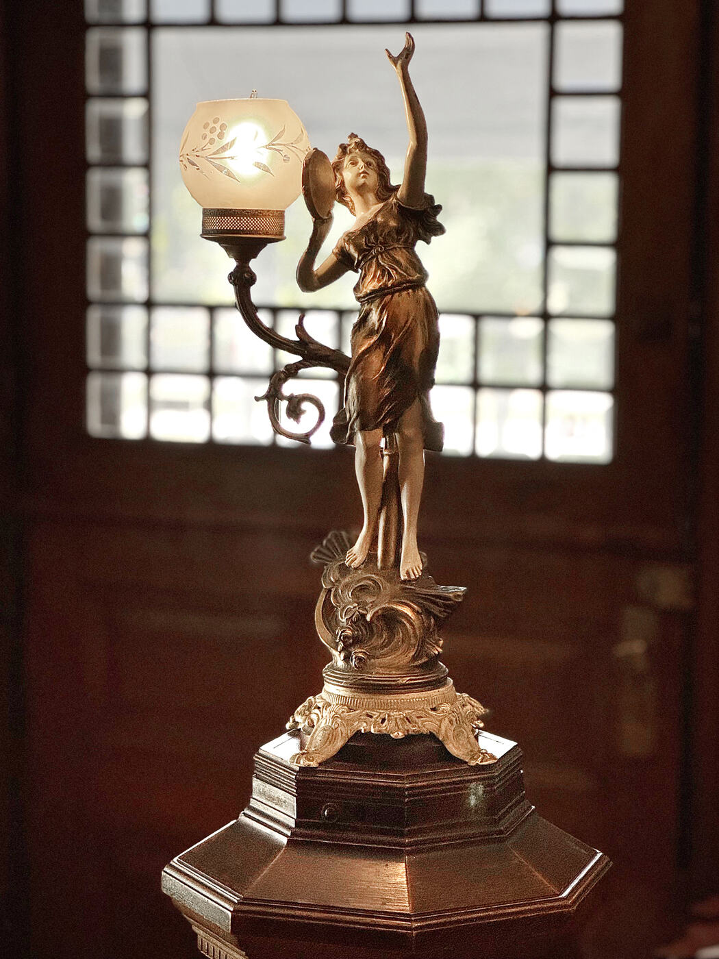 The figural newel lamp at the Union Avenue Thoroughbred Club