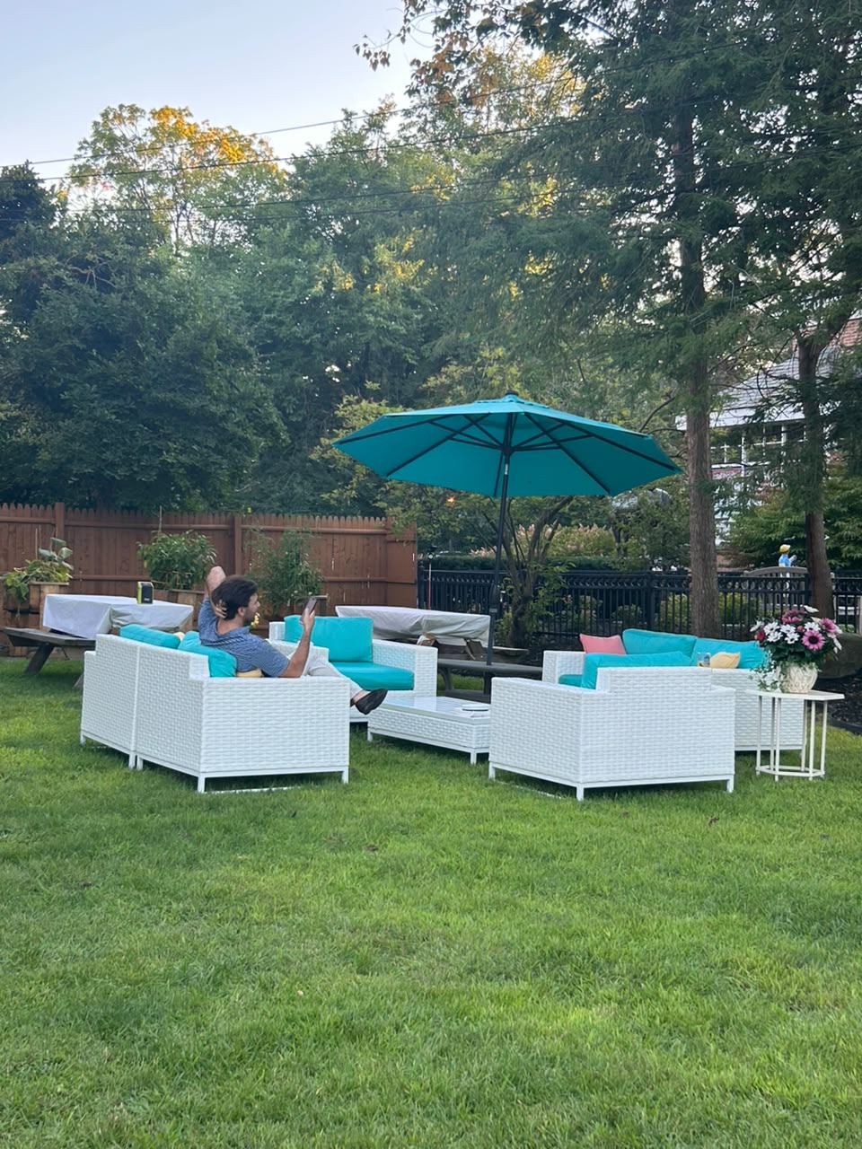 Evening lounge seating on the back lawn at the Union Avenue Thoroughbred Club